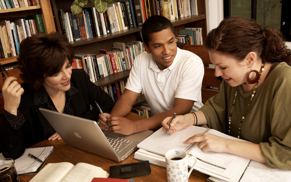 adult students studying in library