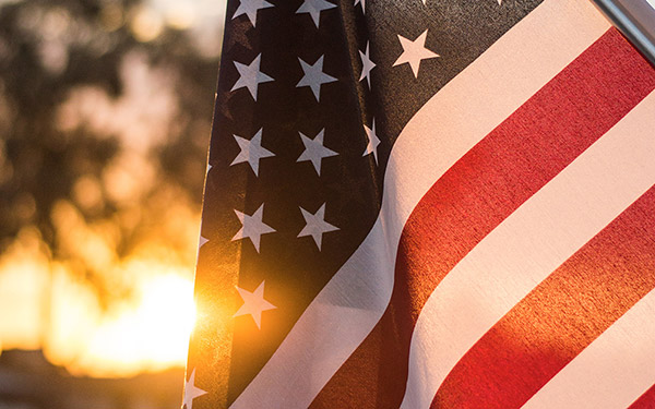 US flag at sunset