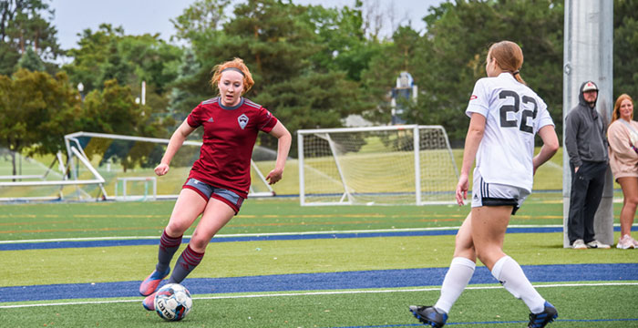 Rapids youth girls making a play during a game