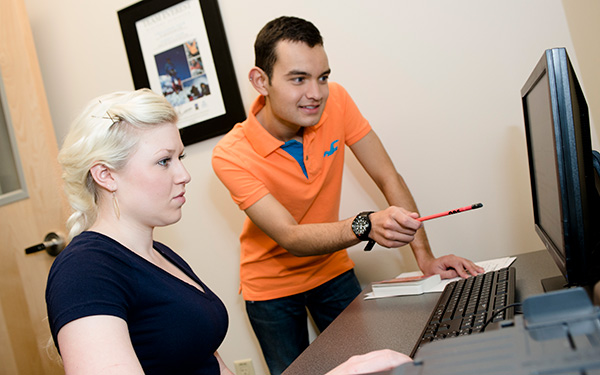 work study student on computer