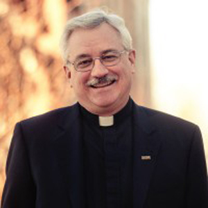 Headshot of Father John Fitzgibbons, S.J.