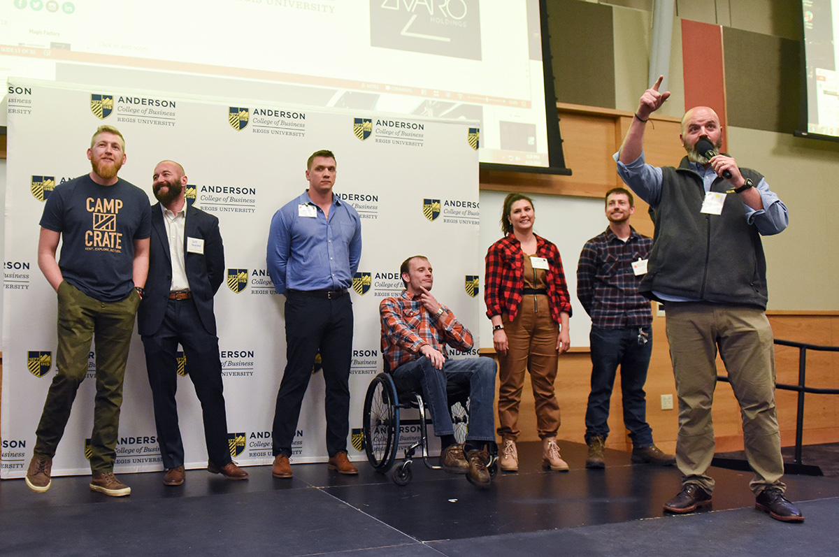 Innovation Challenge winners on a stage receiving their awards