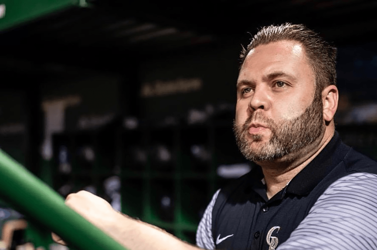 Mike “Tiny” Pontarelli poses on the job at Coors Field