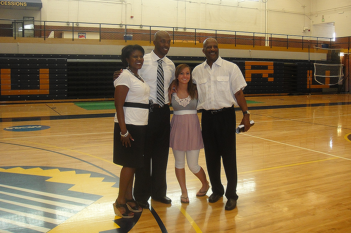 Staci Porter-Bentley, Chauncey Billups, PBLA and Regis graduate Monique Gonzales and Lonnie Porter pose for a photograph.