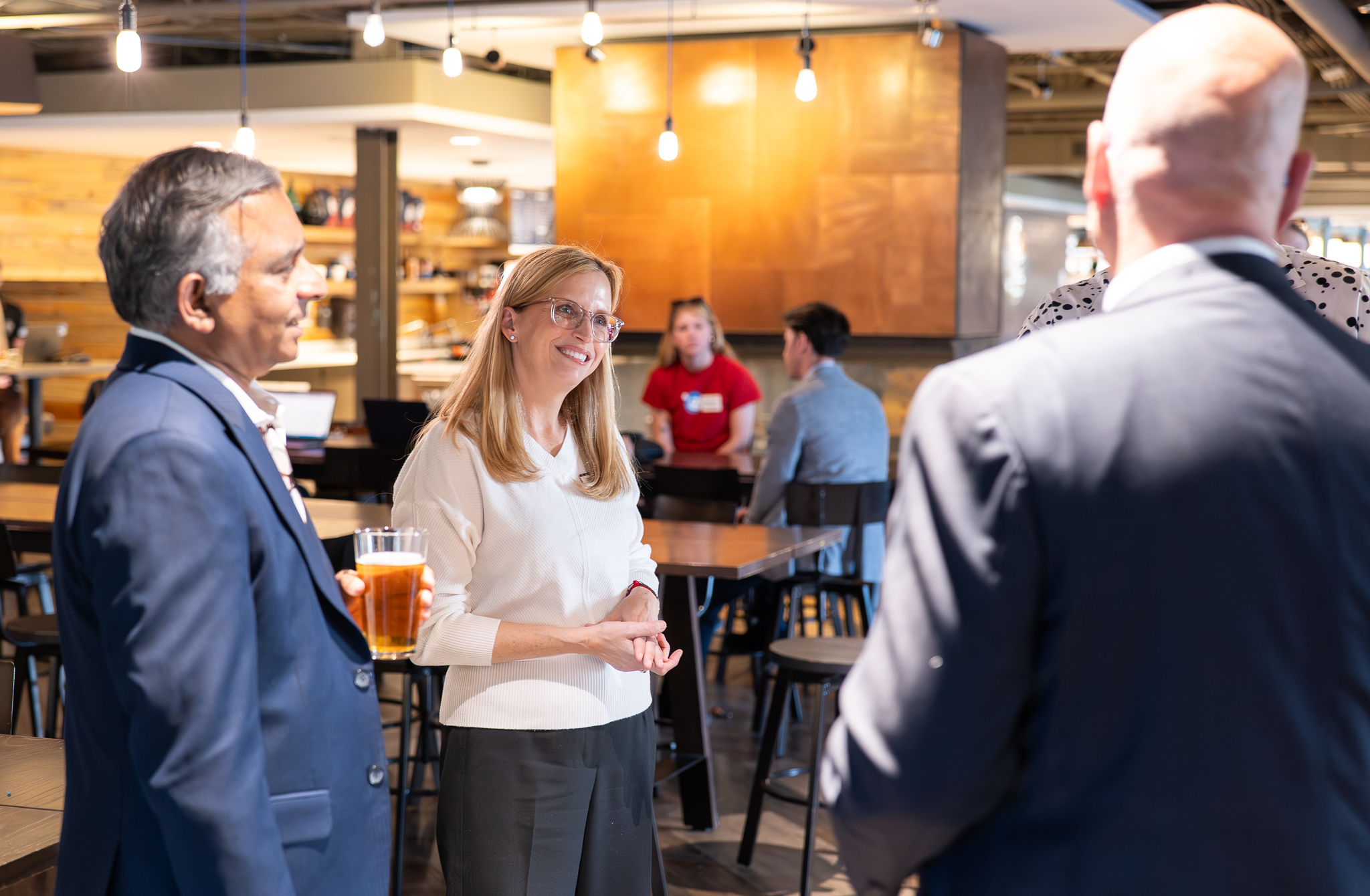 Anderson Alumni gathering during the alumni happy hour at Walkers Pub
