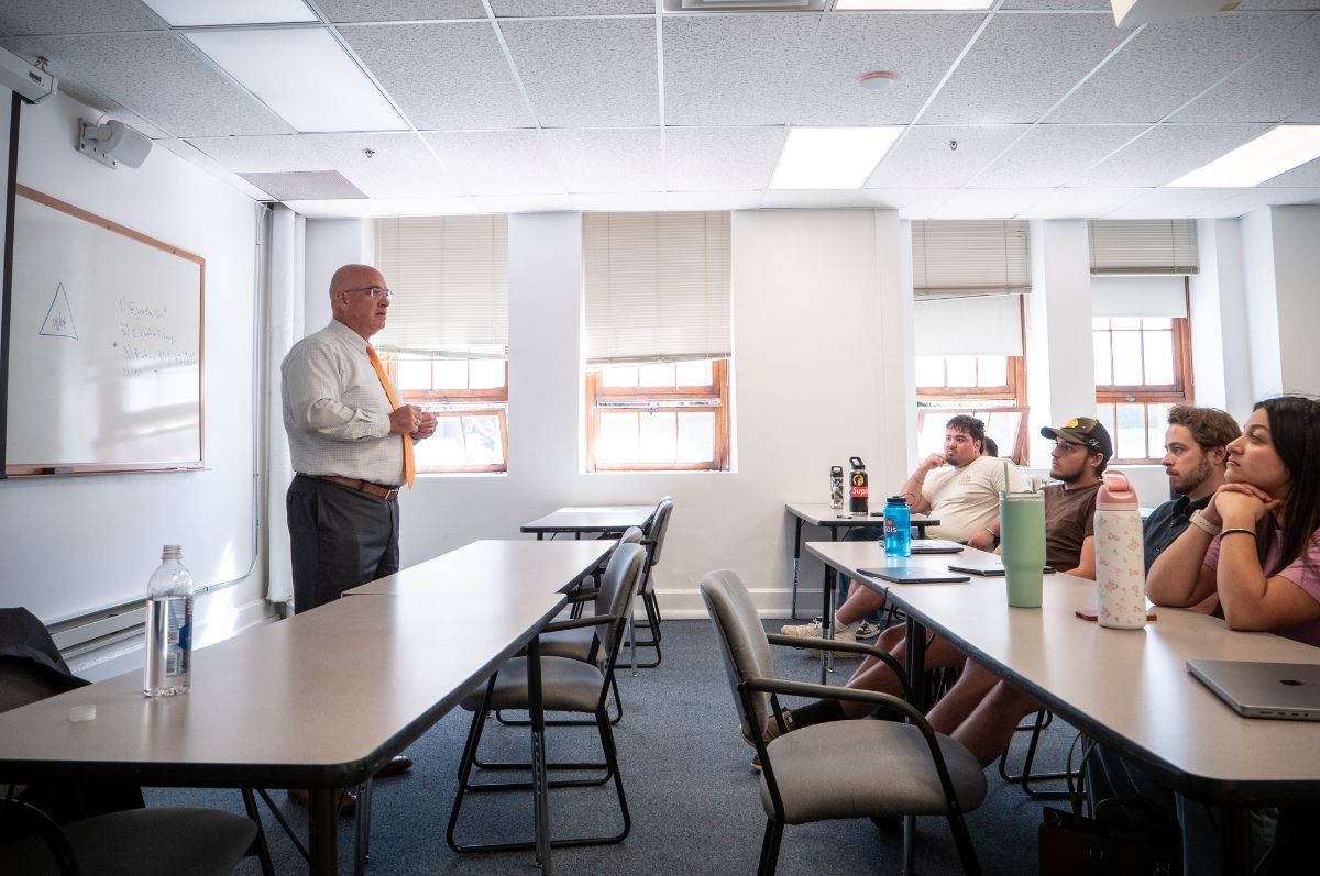 Anderson Alumni speaker in the calssroom talking to students