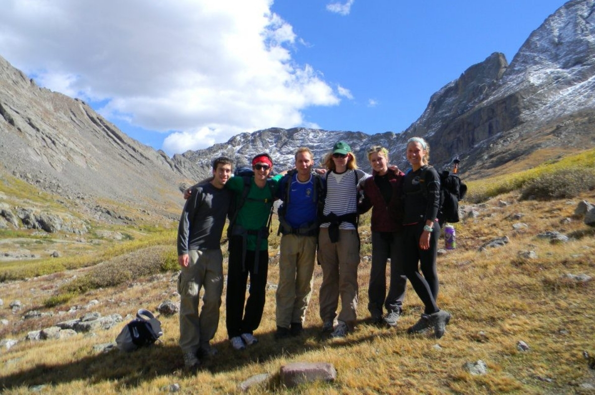 Anne Flower as a student hiking with the OAP