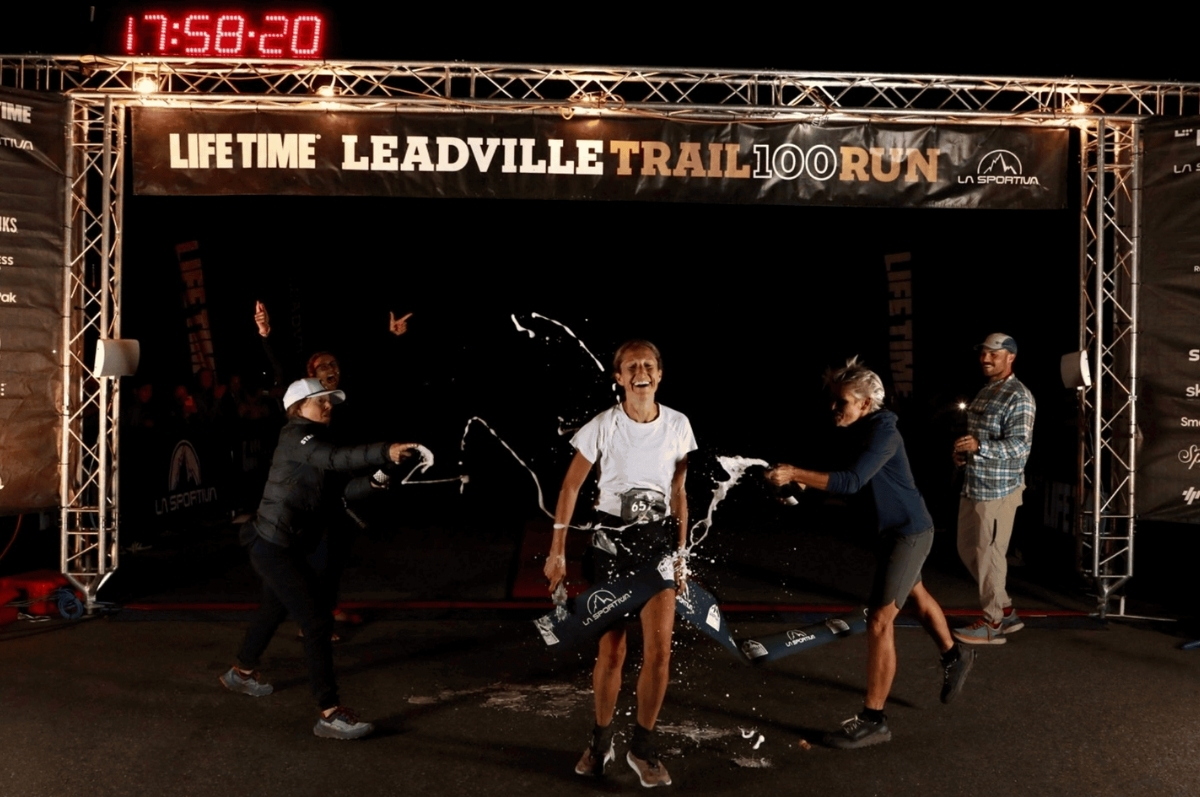 Regis alumna Anne Flower crossing the finish line of the Leadville Trail 100 Run, via Leadville Race Series
