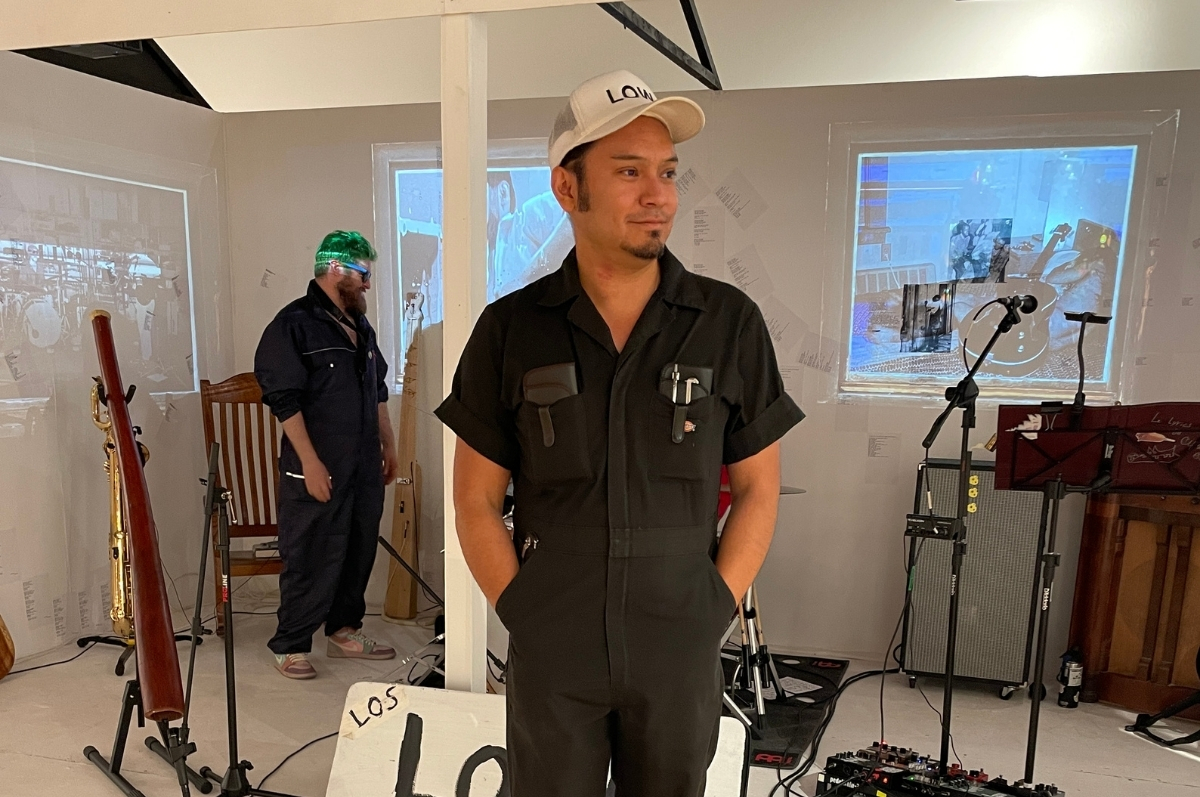 Cipriano standing in the exhibition before the opening