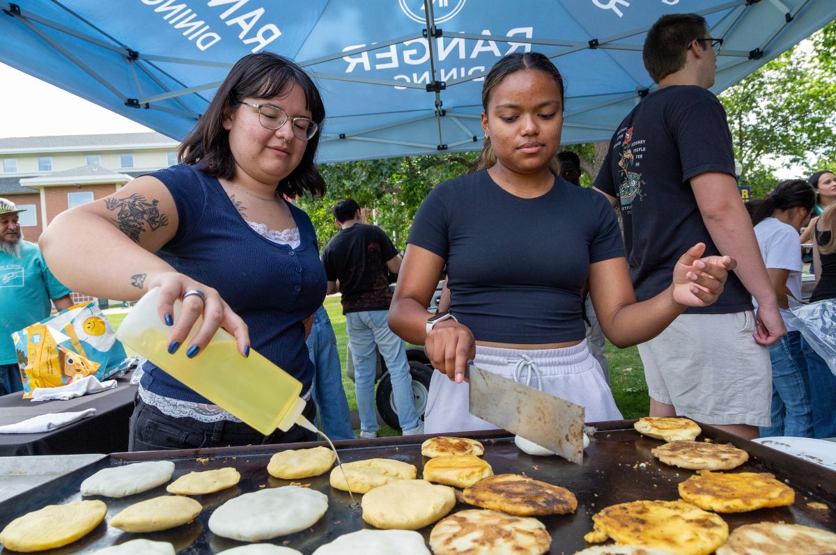 Students grilling arepas on the Quad