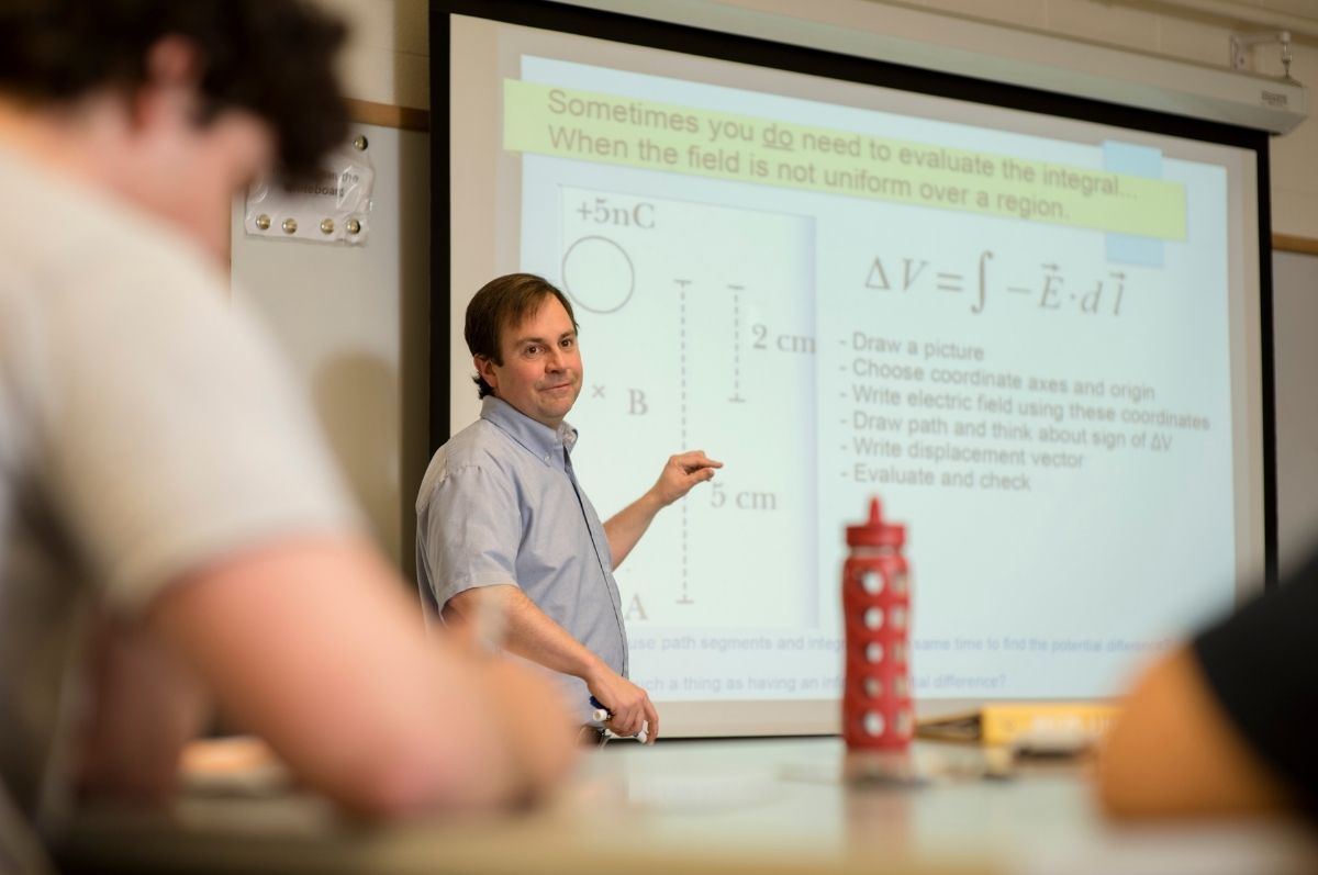 man in front of classroom