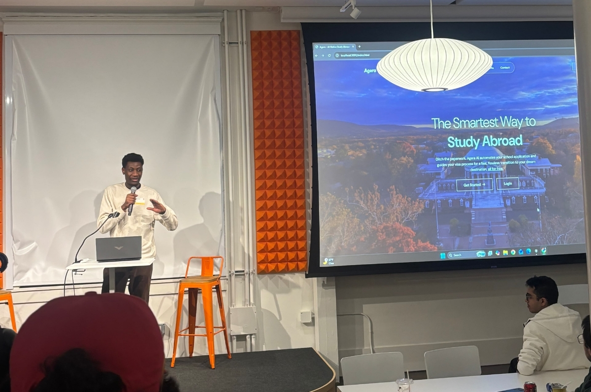 Student Nathaniel Wankio presenting at the hackathon