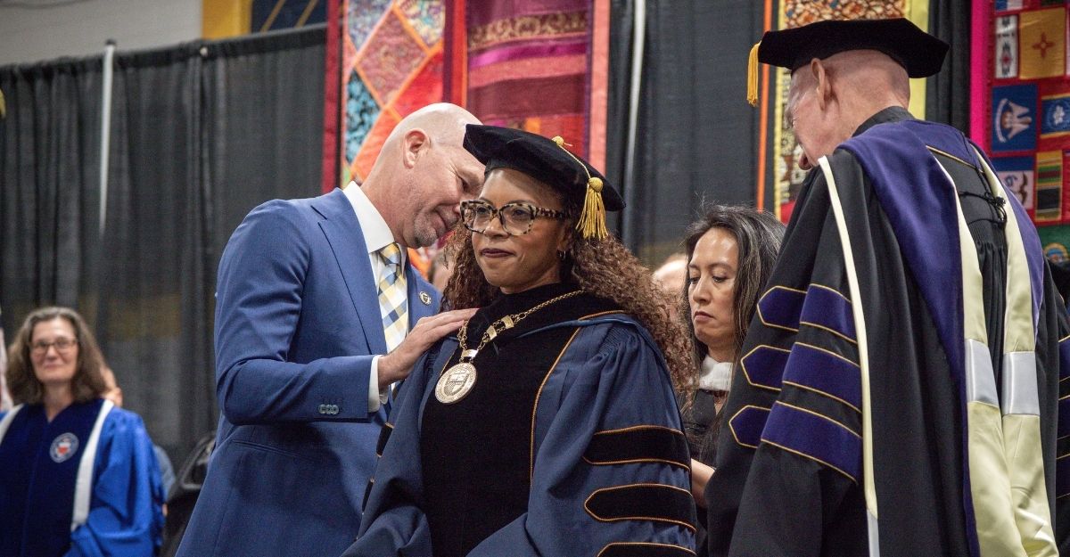 President Cooper Whitehead receiving the medal