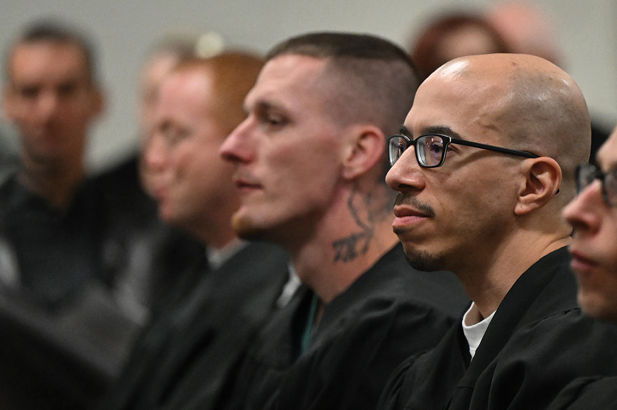 Jason Bondurant and other Inside/Out graduates observe their commencement ceremony.