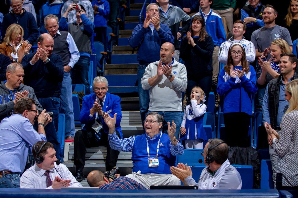 University of Kentucky fans clap for hall of fame coach Joe B. Hall