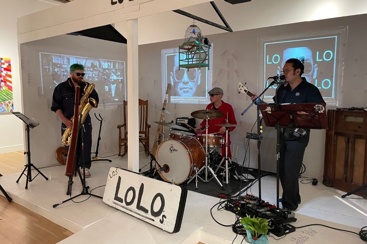 Los Lo Los performing at the opening of the exhibition