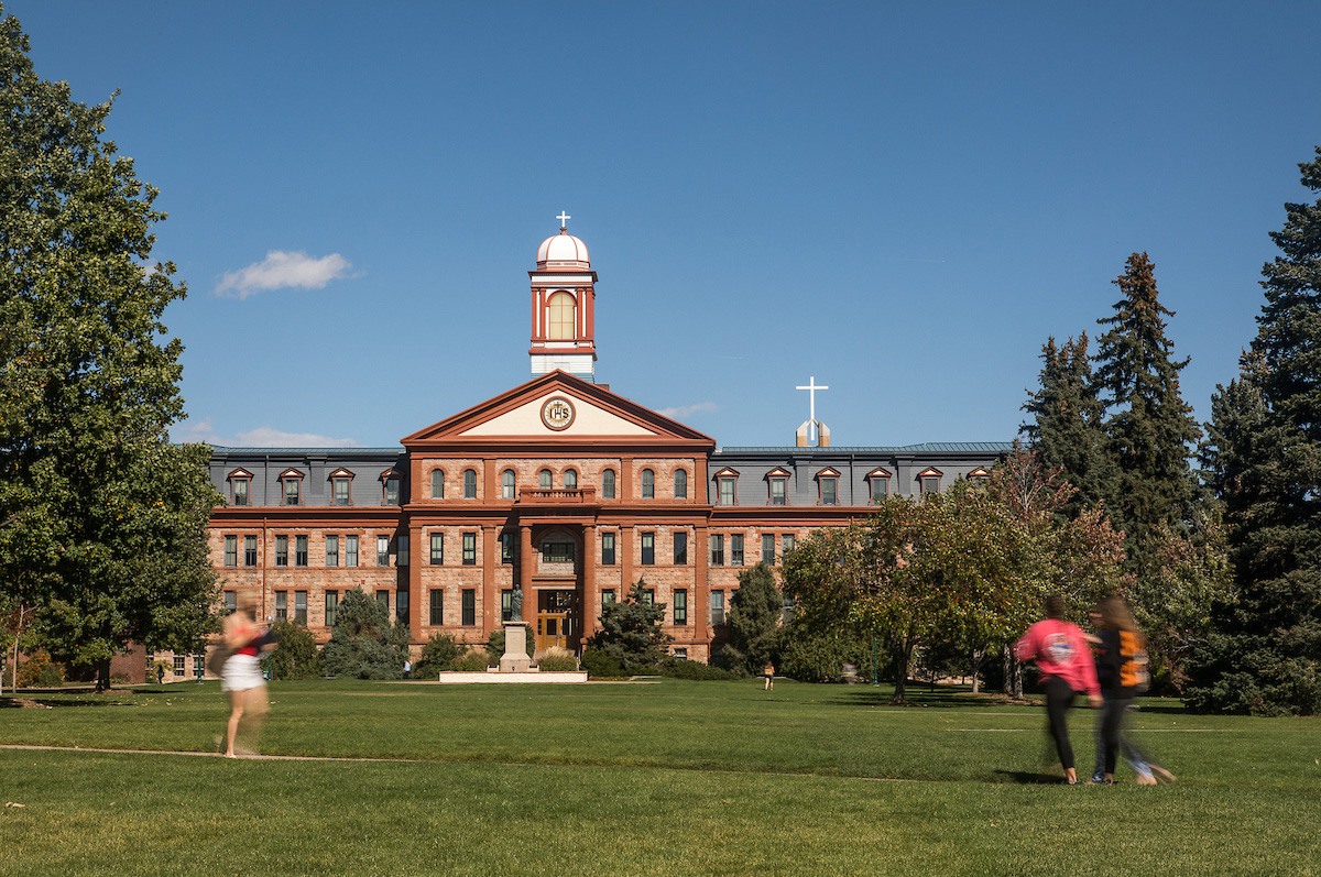 Main Hall viewed across Boettcher Commons on a clear summer day