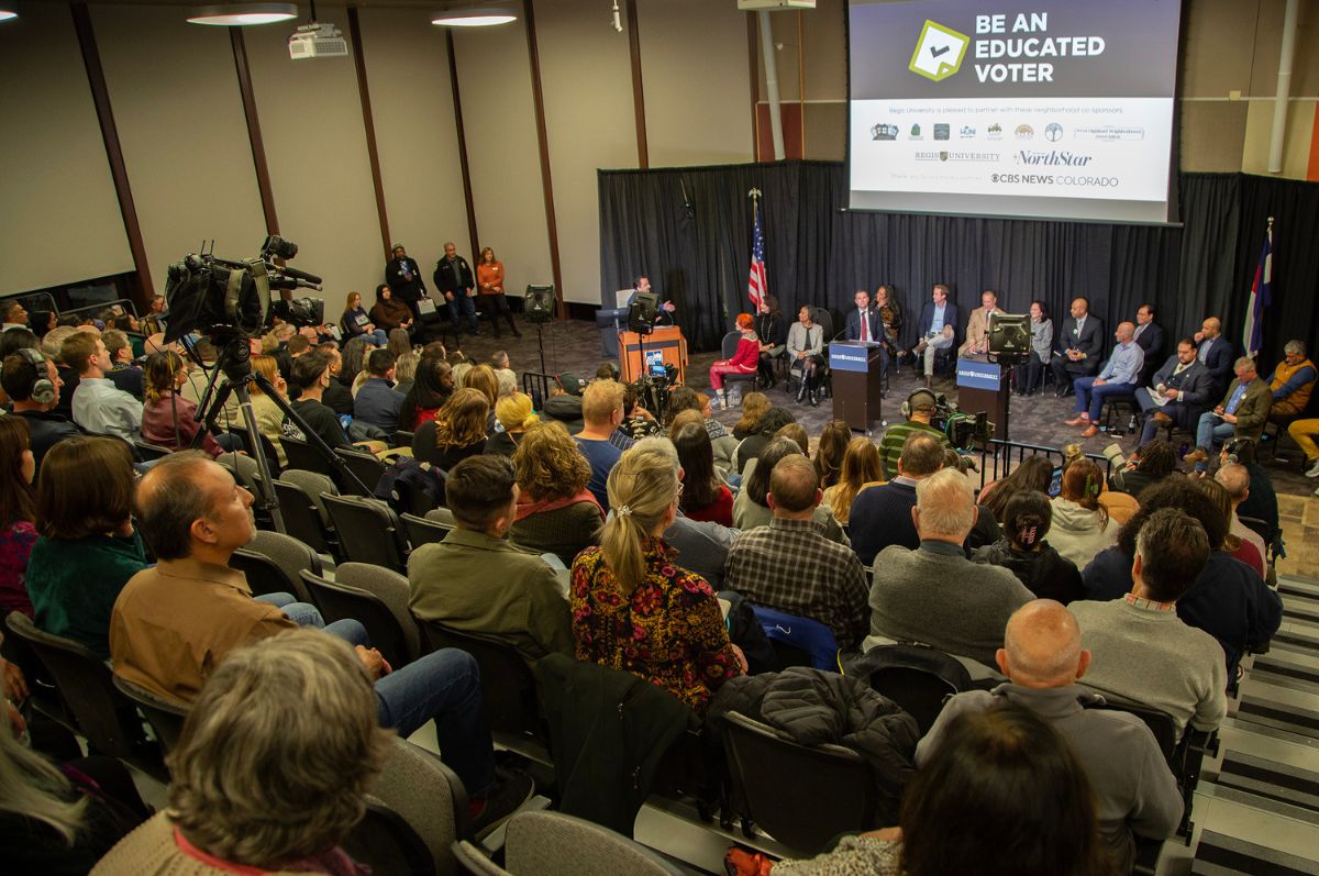 audience attends Denver Mayoral debate at Regis University