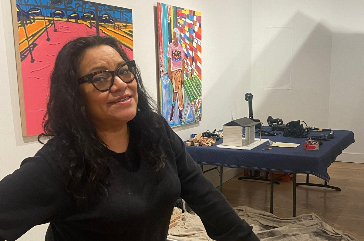 Sylvia Montero at the installation of the exhibition
