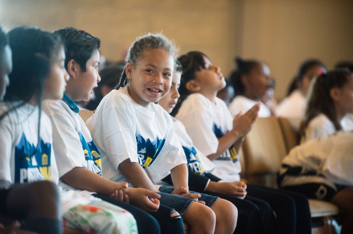 PBLA students sit in the St. John Francis Regis Chapel