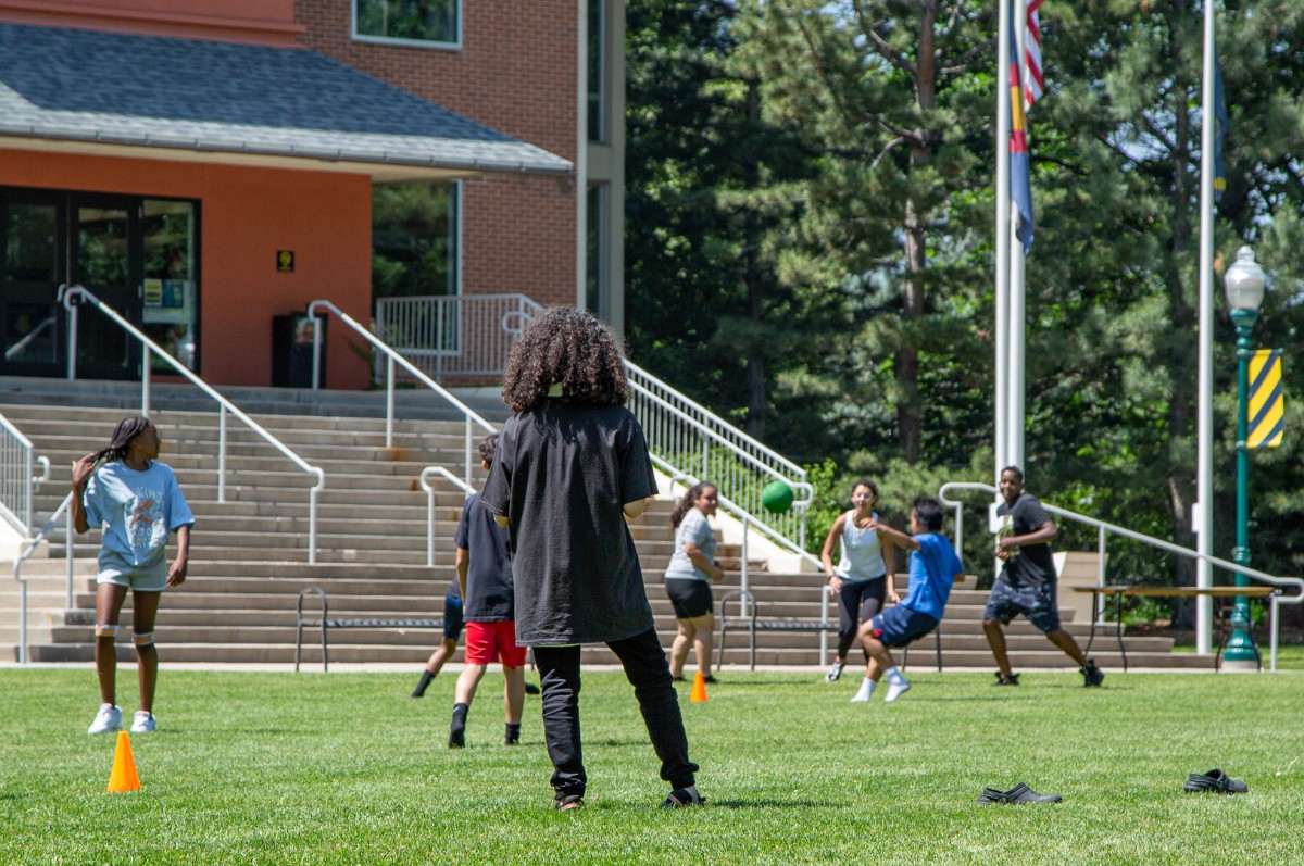 Students of the PBLA playing on Regis campus