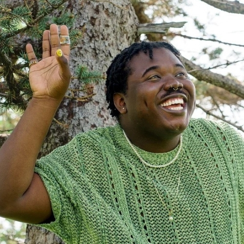 Headshot of Regi Worles, lead singer of DOGTAGS