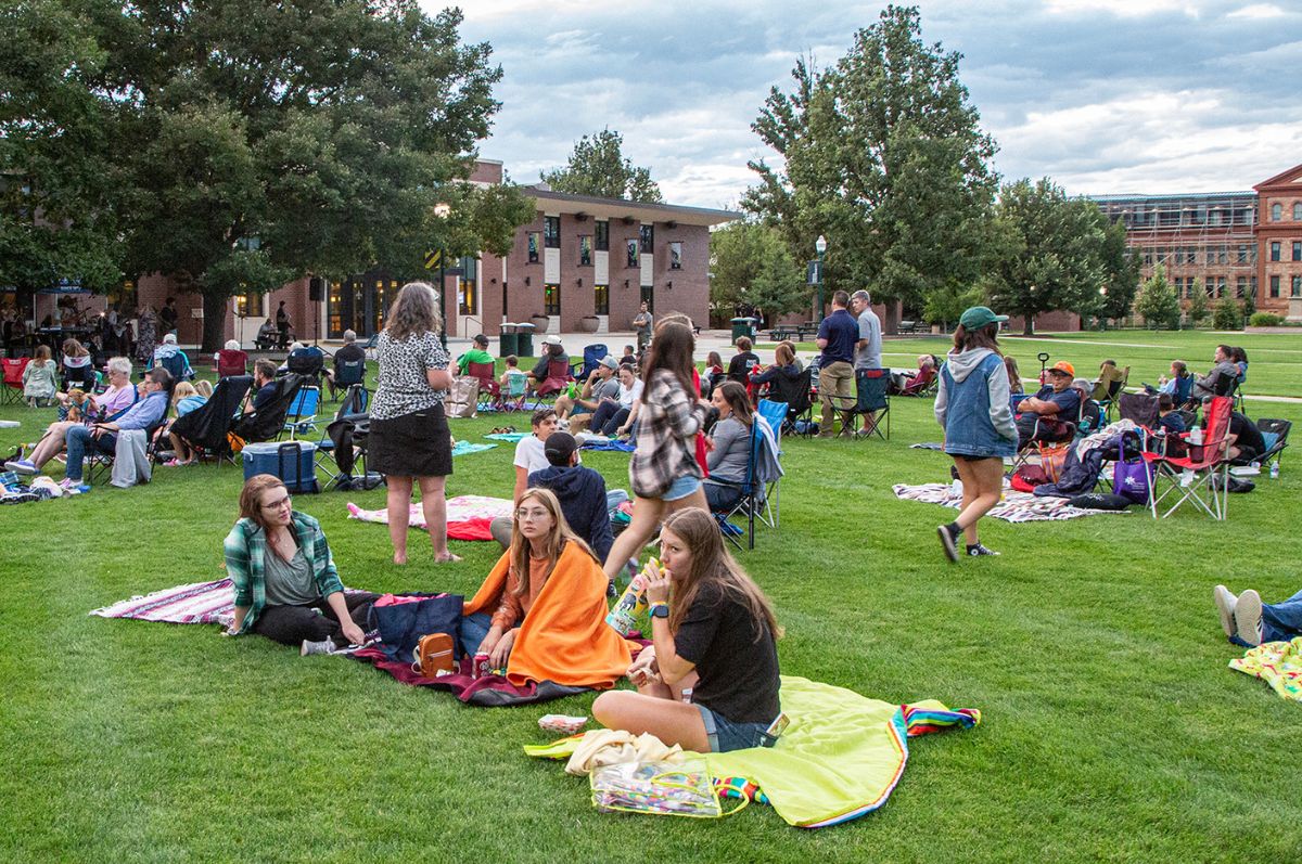 Peopel gathered on Regis campus Boettcher Commons for RegiRama event