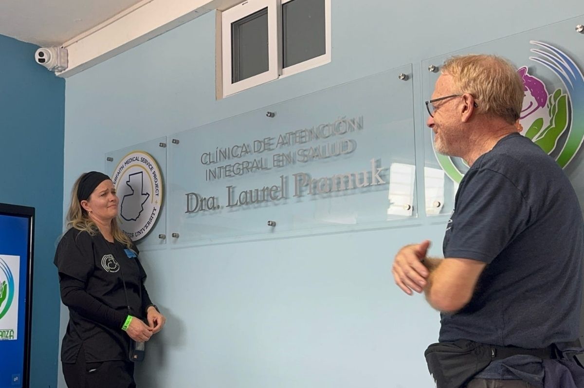 The unveiling of the renamed clinic, with Lauri and Chris Pramuk