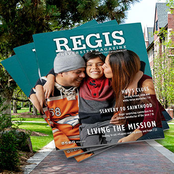 Regis University Magazine cover | Hue's Clues | Slavery to Sainthood | Living the Mission - cover image of happy family embracing