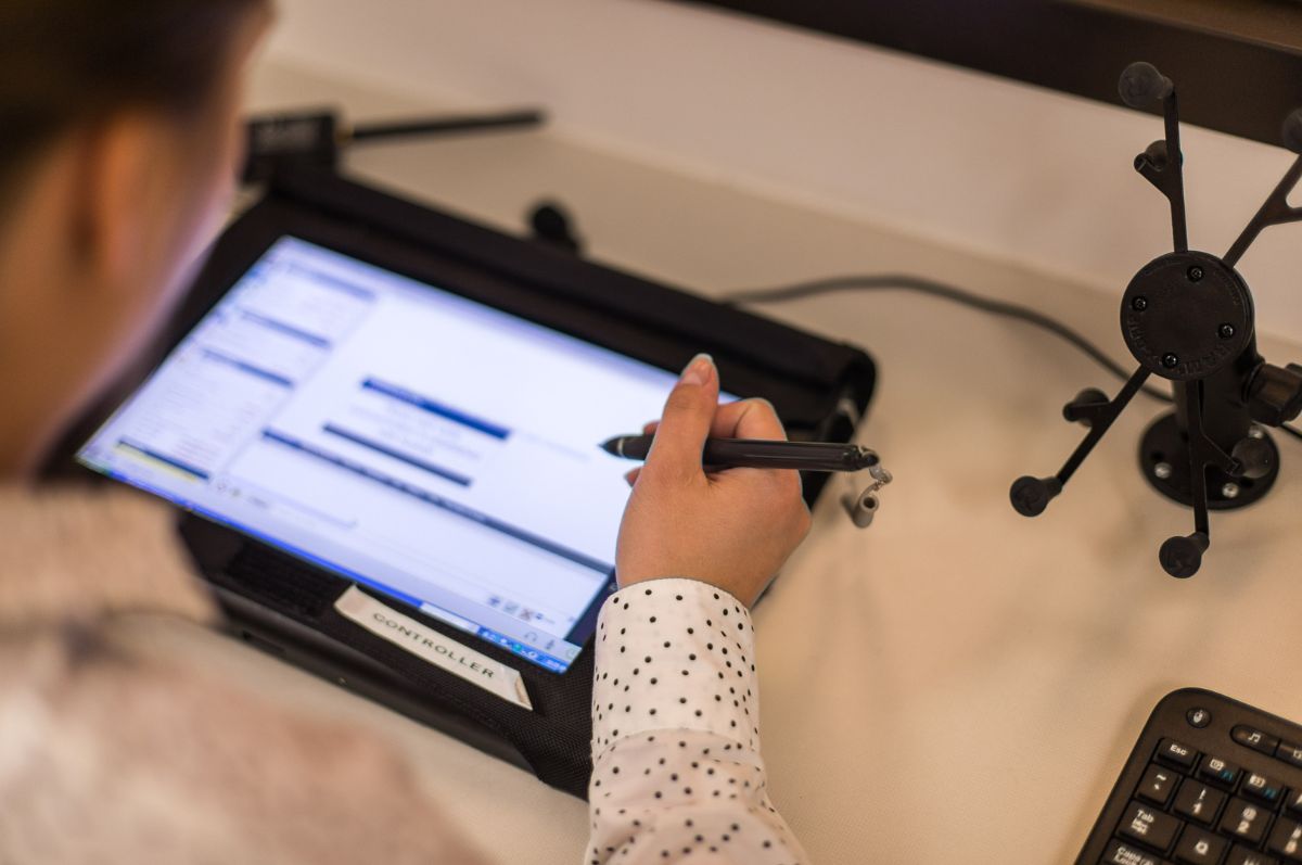 woman works on a tablet