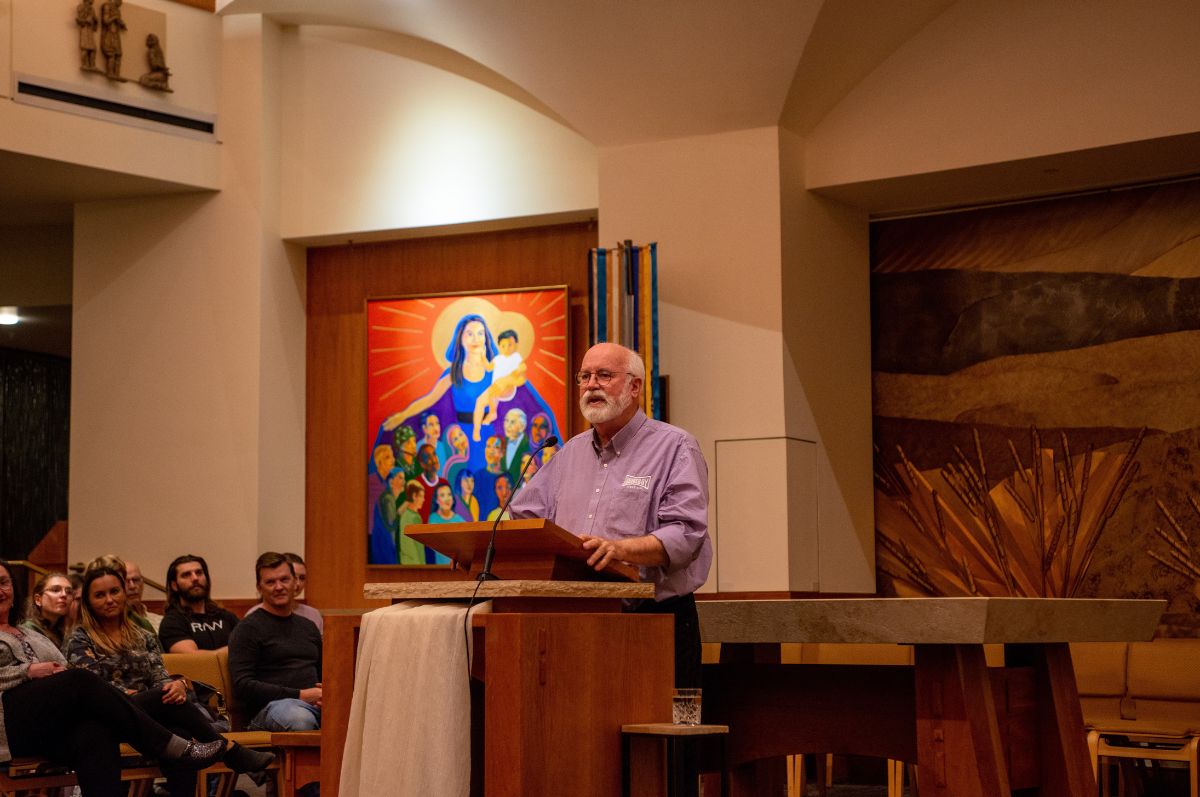 Rev. Greg Boyle speaks to a crowd at Regis