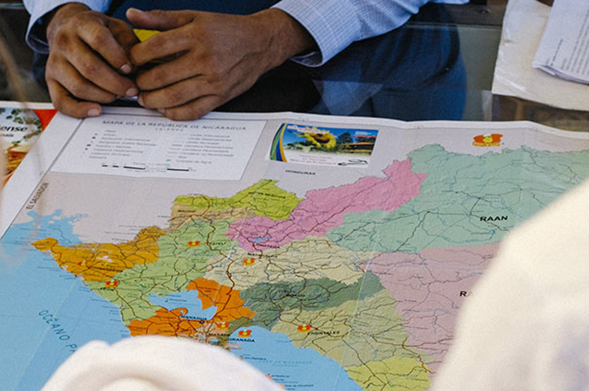 students examining map