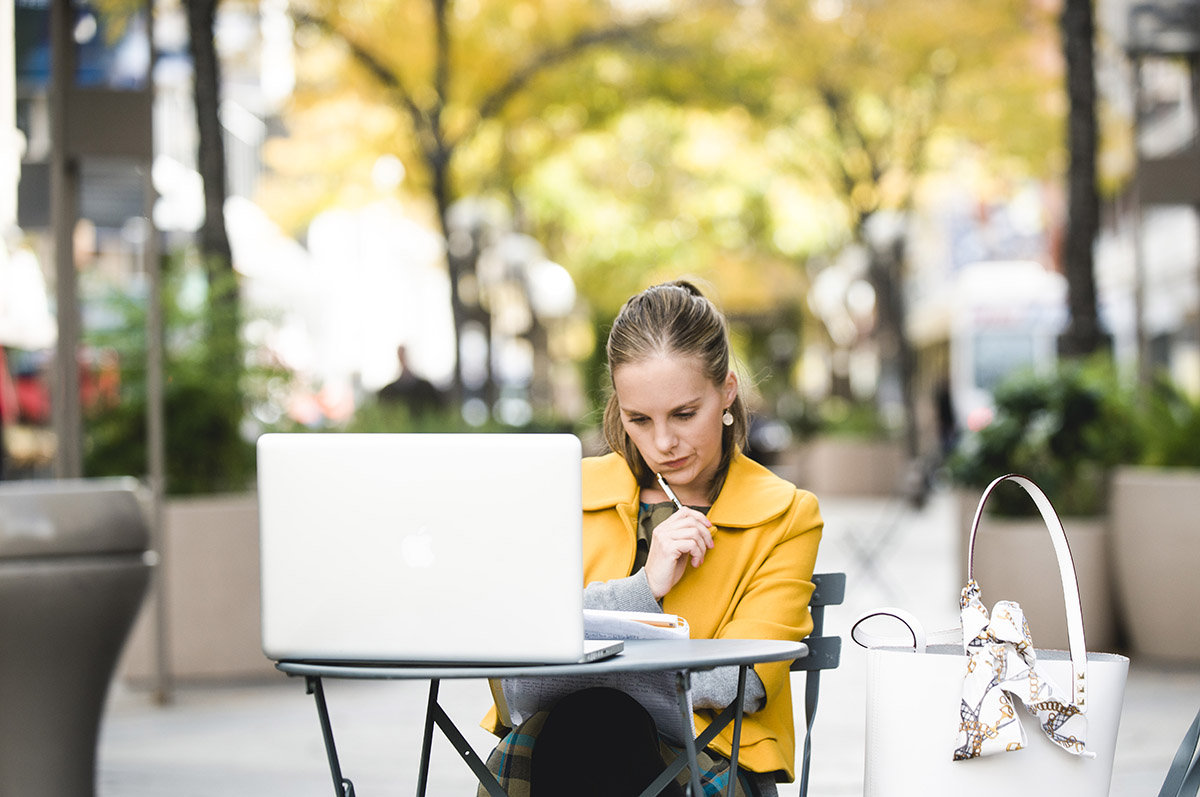 woman sitting and studying