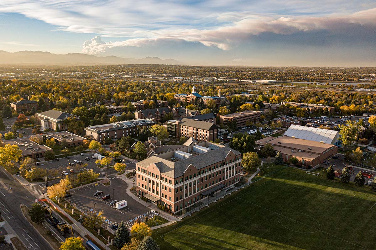 Regis University and Cocoa Cola logo