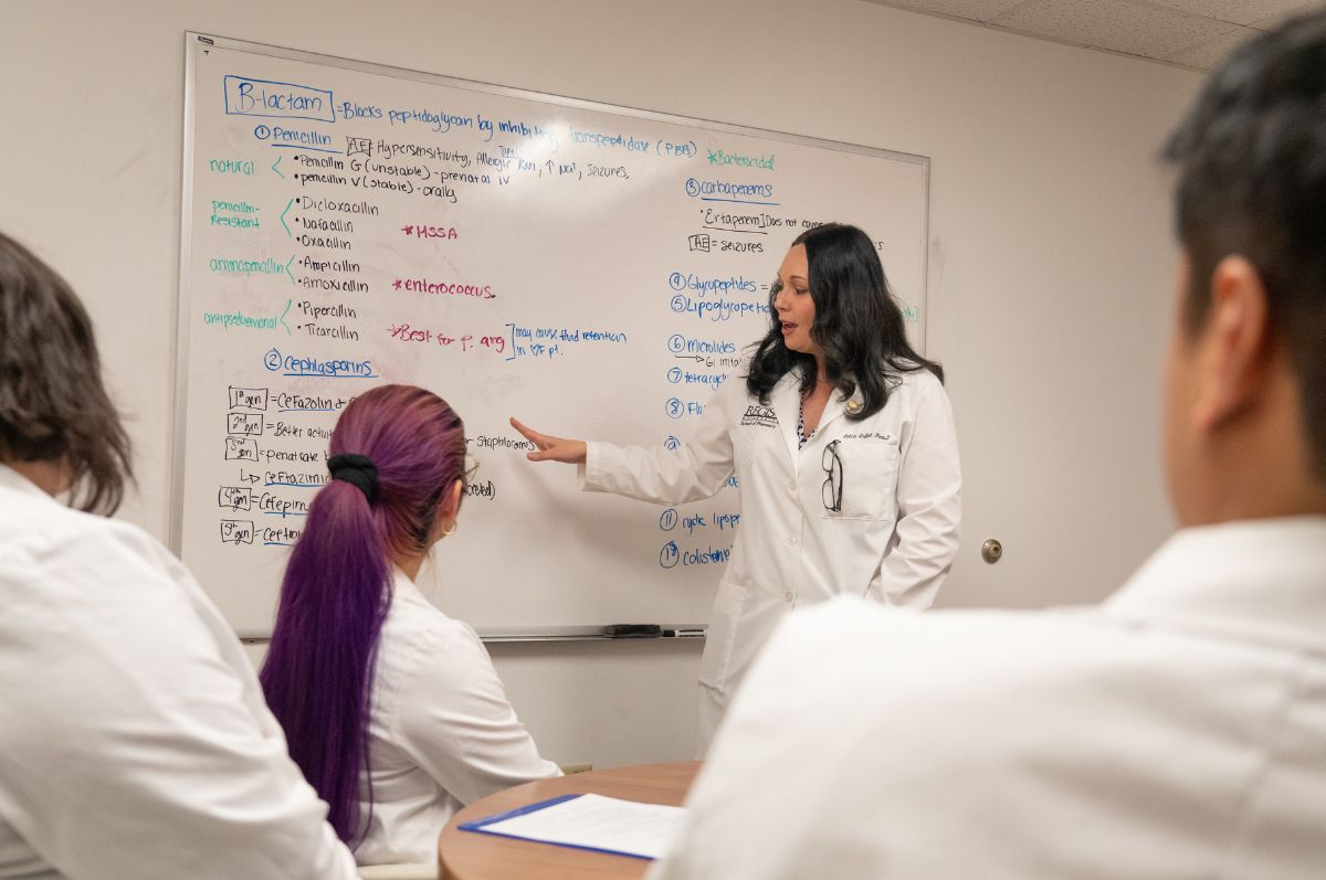 instructor speaks to pharmacy students