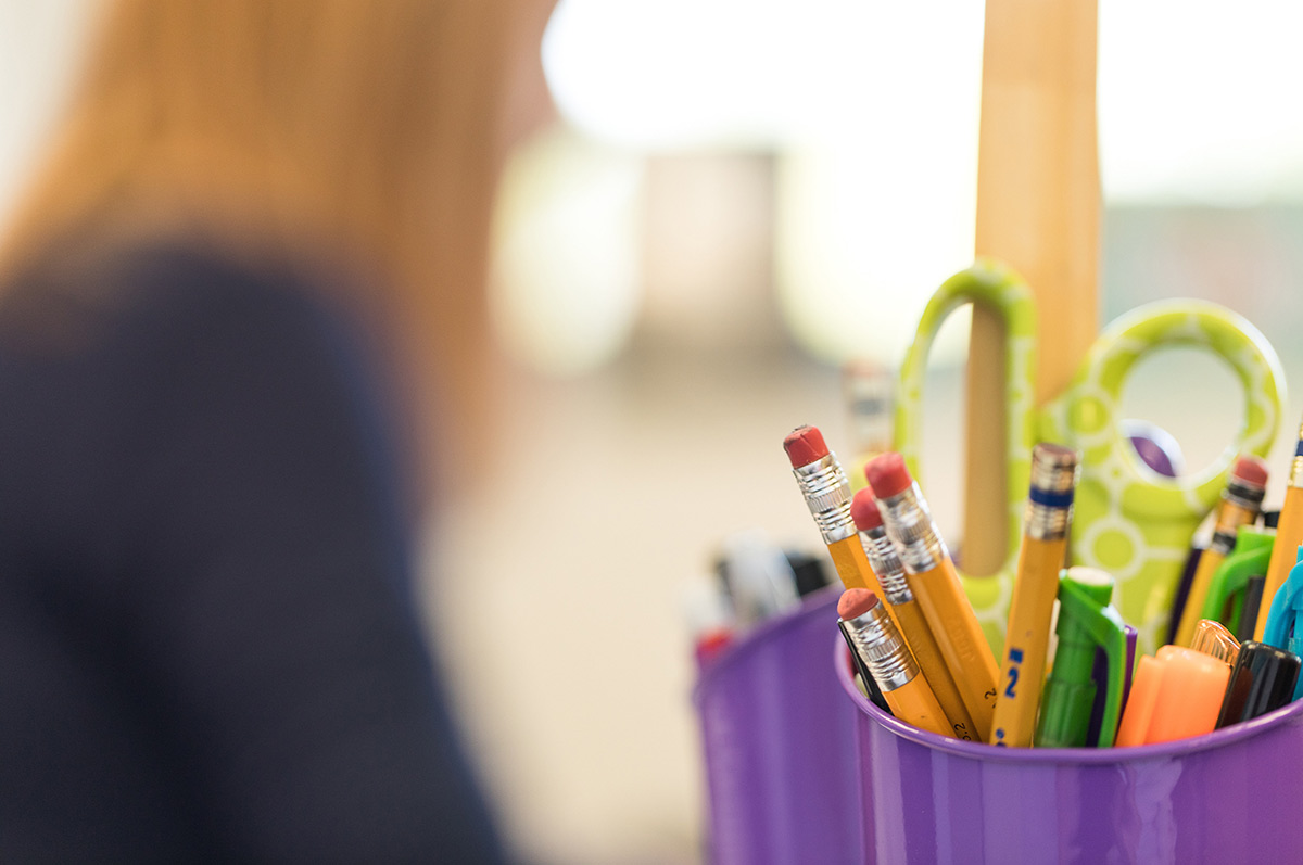 cup of pens and pencils