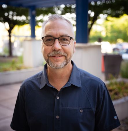Headshot of USU professor, Troy Allan