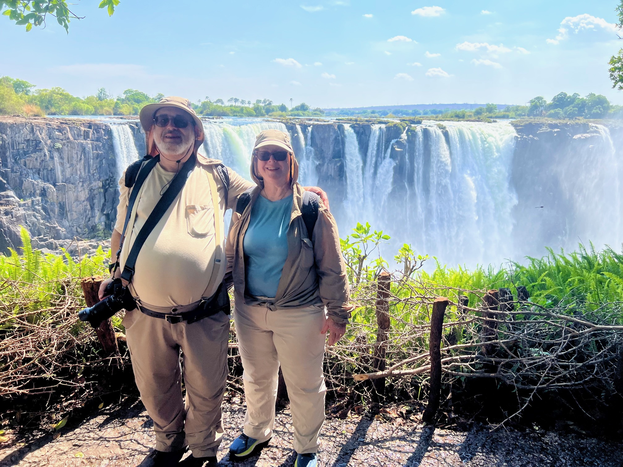 The Wincors posed in front of a waterfall